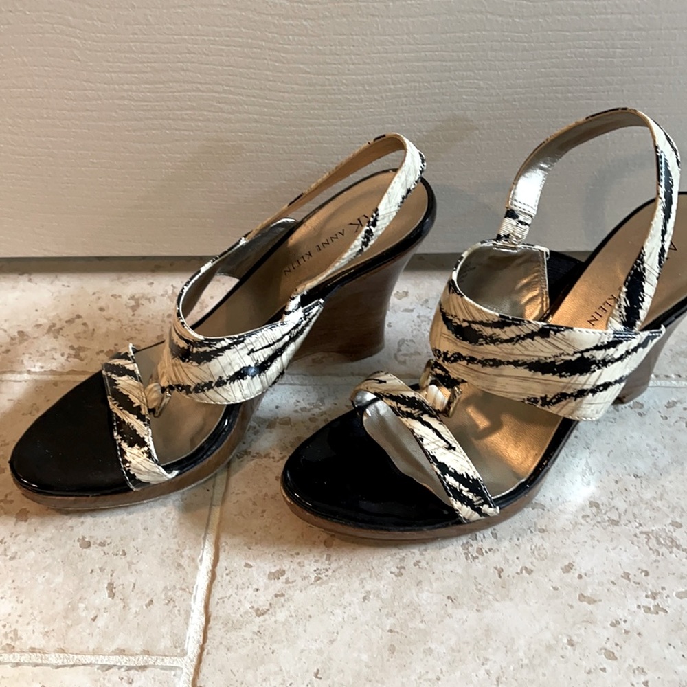 Anne Klein animal print strapped wedge heels.
